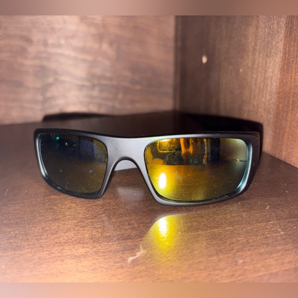 Oakley Black Sunglasses with Gold Lenses